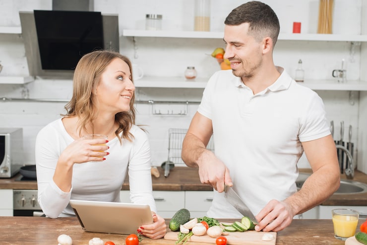 Couple preparing healthy meal | Holistic Menus