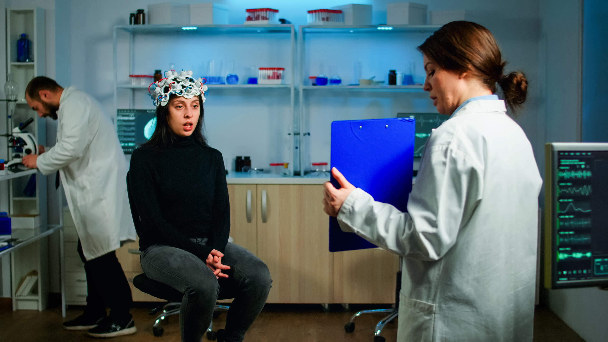 Woman wearing EEG cap | Holistic Menus