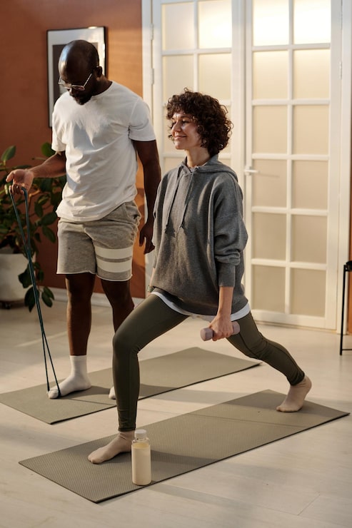Woman performing fitness lunge | Holistic Menus